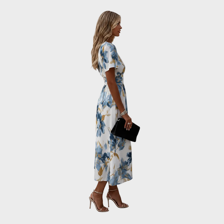 Nika – Elegantna Cvetlična Midi Obleka