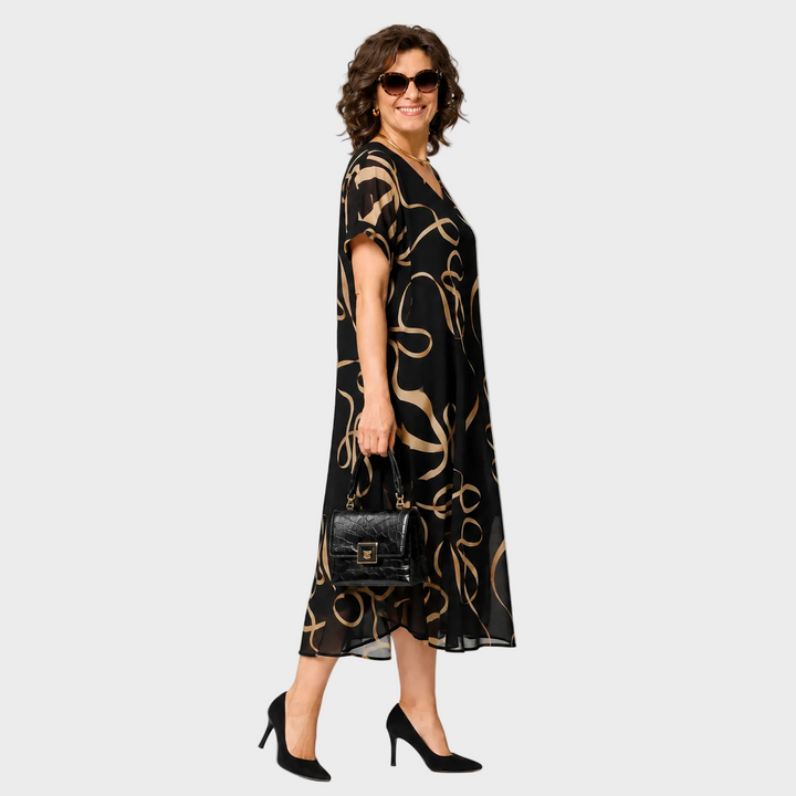 Elena – Elegantna Obleka Z Modernim Vzorcem