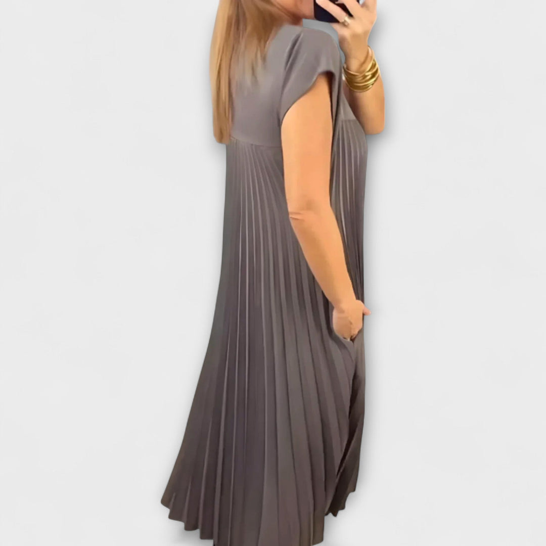 Zairelle – Elegantne Plisirane Obleke