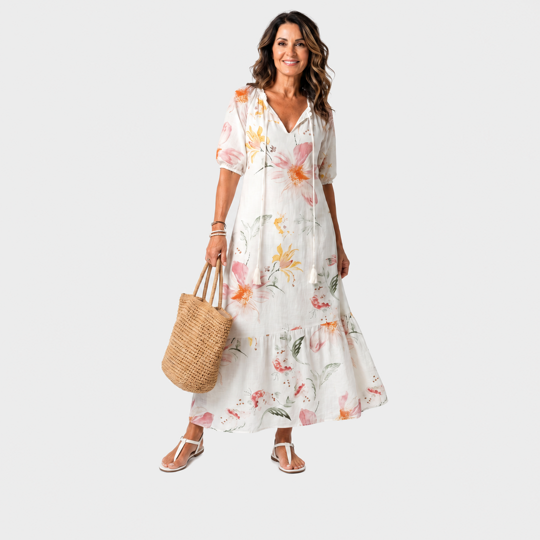 Lana – Bela cvetlična boho midi obleka z resicami
