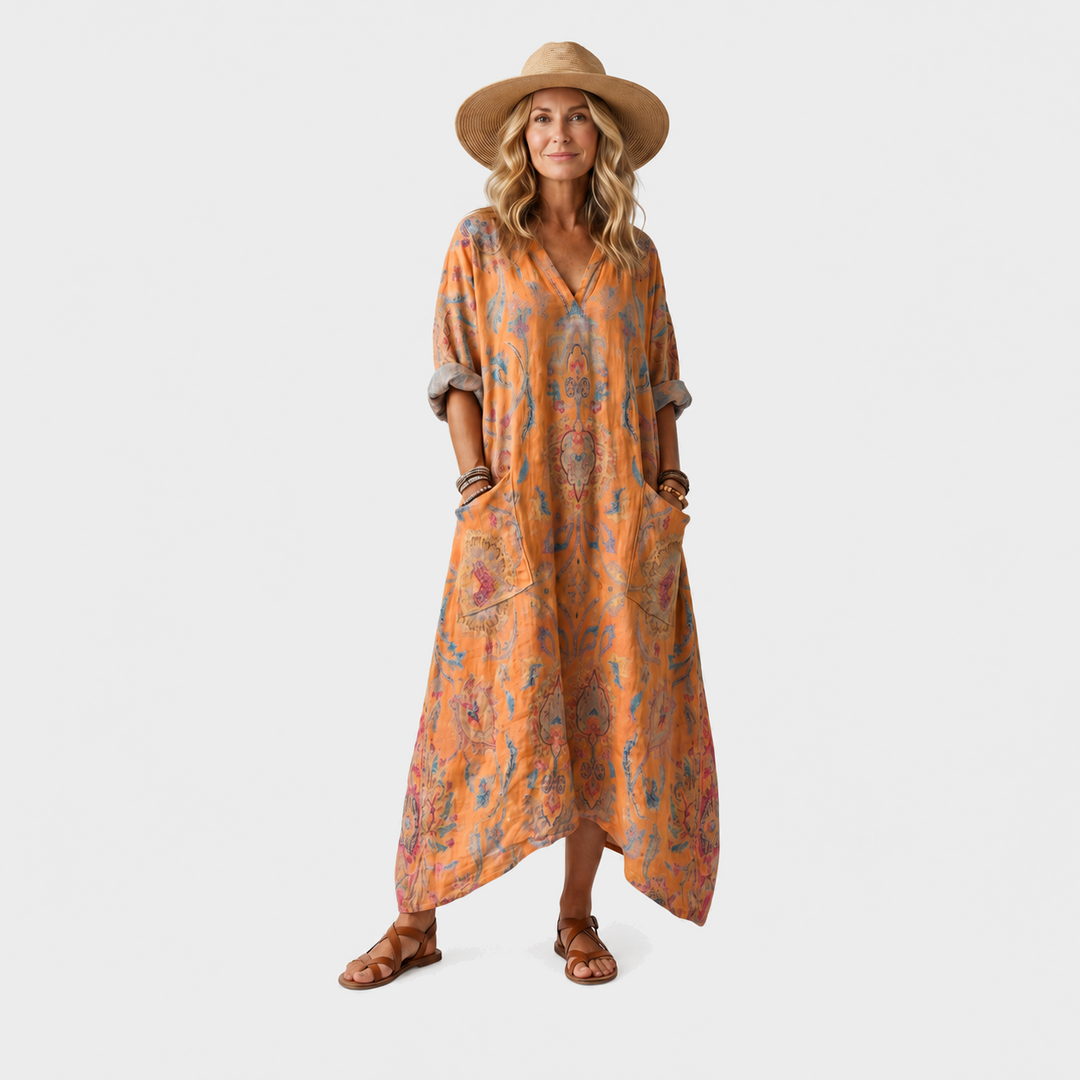Darja – Oranžna vzorčasta boho midi obleka z žepi